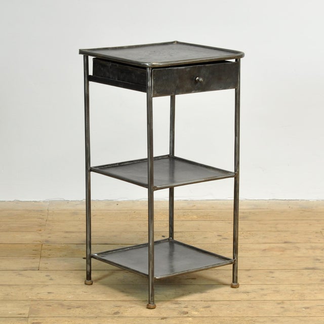 This iron bedside table exudes history and style. Originally from a hospital dating back to the 1910s, it has been...