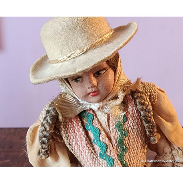 This is a very good hand made Gaucho female cowgirl doll, South American, c1940s. Depicts a female with plastic face but...