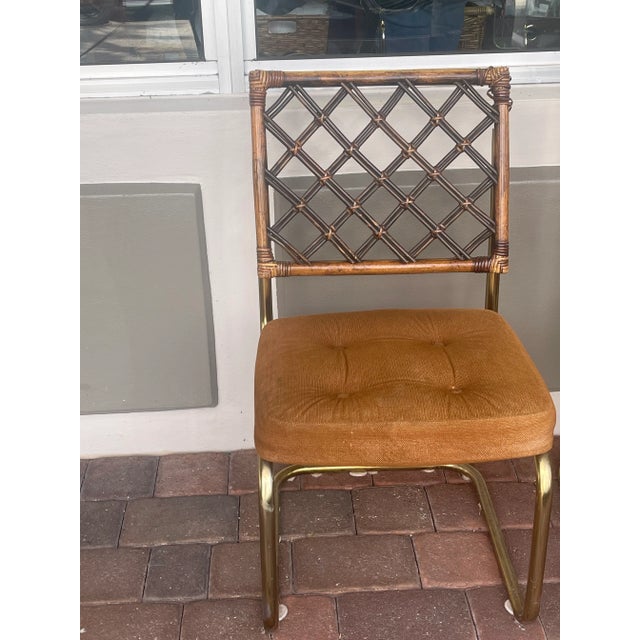 Milo Baughman attributed 1950 th bamboo rattan dining set of 4 chairs and table base. Original upholstery with signs of...