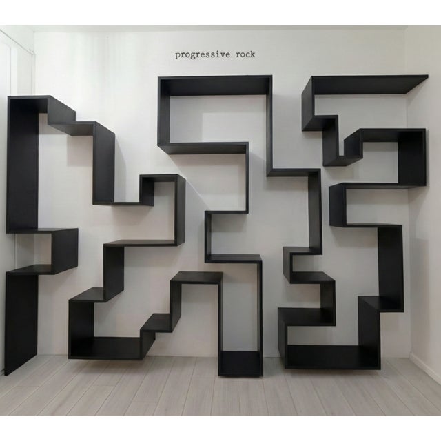 The Progressive Rock Bookshelf is the most complex expression of 'Invisible Architecture' by Dario Nasuti. It blends...