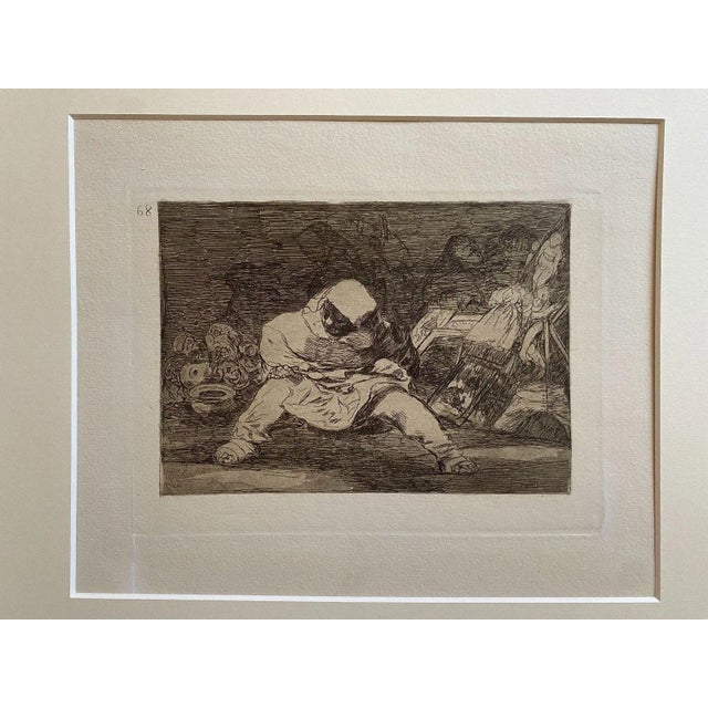 Que Locura - Plate 68 from Los Desastres de la Guerra (The Disaster of the War) is an original black and white etching...