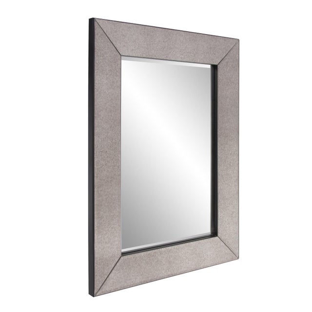 A rich smokey antique mirror covers the outer frame of this simply elegant, beveled mirror. The small size of this mirror...