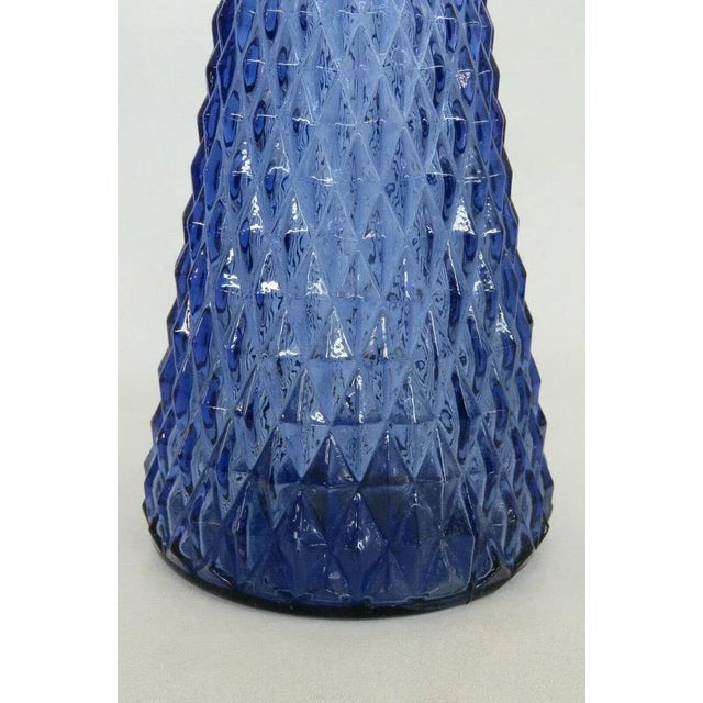 This lovely glass decanter / pitcher vase has the brilliant Diamond Point pattern decorating the body, as well as a very...