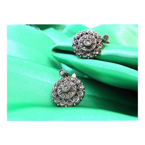 Circular Gold and Silver Earrings with Diamond Chips, Set of 2, in Very Good conditions. Designed 1980 to 1989 This piece...