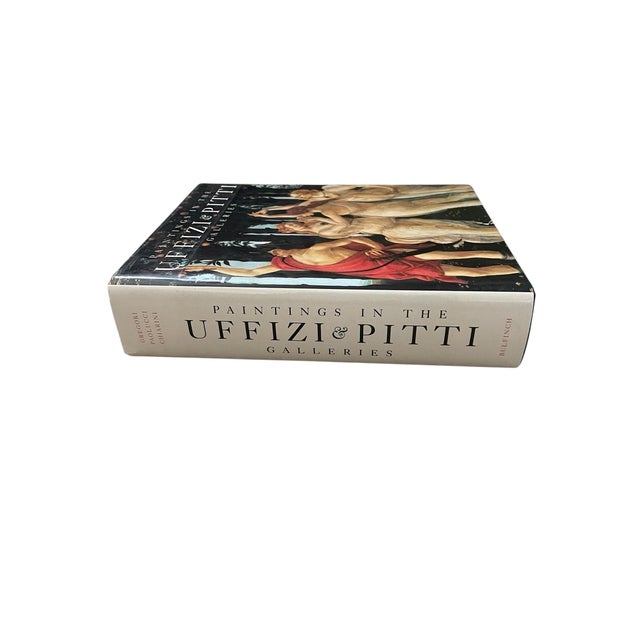 "Paintings in the Uffizi and Pitti Galleries Vol. 1" by Mina Gregori is a vintage art book published in 1994 by Little...