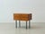 An elegant 1960s nightstand with clean lines and a balanced combination of materials. The compact body, finished in a warm...