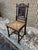 Early 20th Century Pair of Antique French Renaissance Style Carved Cane Seat Brittany Side Chairs For Sale - Image 10 of 12