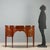 Victorian style sideboard crafted in mahogany, adorned with elegant stringing and inlays in maple and bois de rose. The...