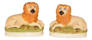19th C Staffordshire Lions - a Pair