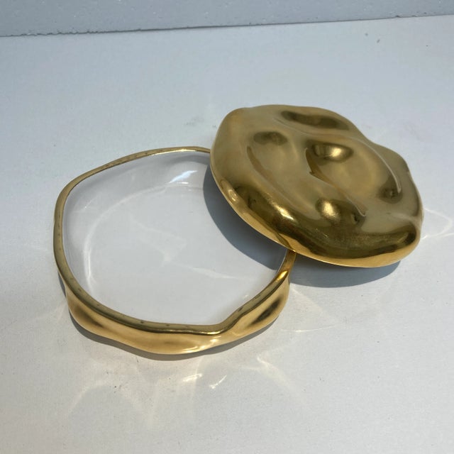 Gold finish pottery from Waylon Gregory Studios, handmade in Peru.