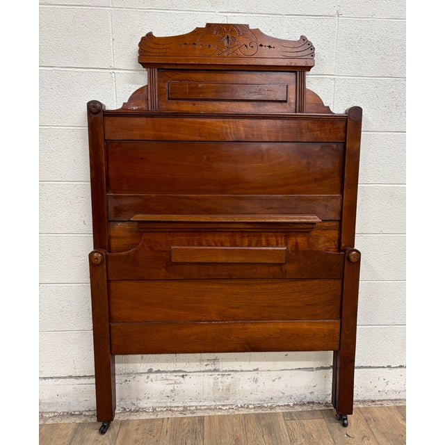 This is a stunning vintage twin sized Victorian Eastlake carved headboard and footboard. Features gorgeous wood patterns...