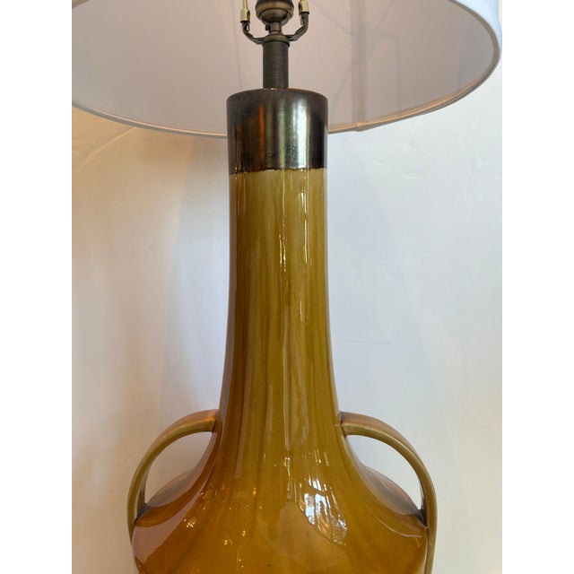 Stylish Global Views Large Mid-Century Style Camel Glaze Lamps - Pair. Camel toned ceramic sculptural urn shaped base,...