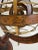 This is a vintage Armillary globe or sphere. This sculptural globe has rings of metal and wood with depictions of the...