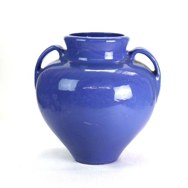 Measures - 16 1/2" x 14 1/8" x 14 1/8" This large antique floor vase is an example of Zanesville art pottery from around...