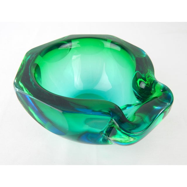 Captivating teal blue and green vintage bowl attributed to Flavio Poli, Seguso Murano, circa-1960s. Polished base with no...