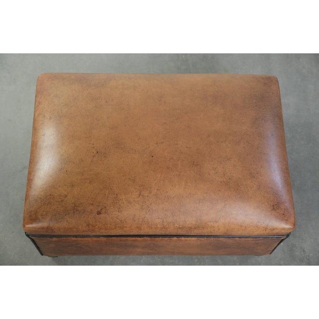 Sheepskin Ottoman with Black Piping For Sale - Image 6 of 9