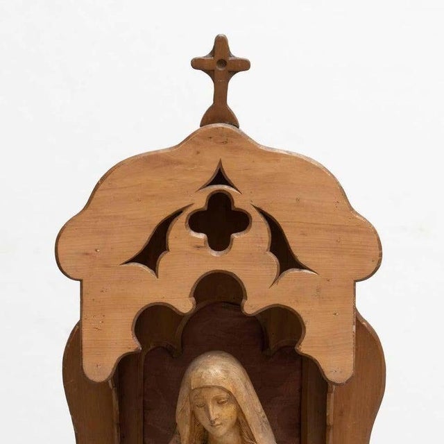 Traditional religious plaster figure of a virgin in a wooden niche. Made in traditional Catalan atelier in Olot, Spain,...