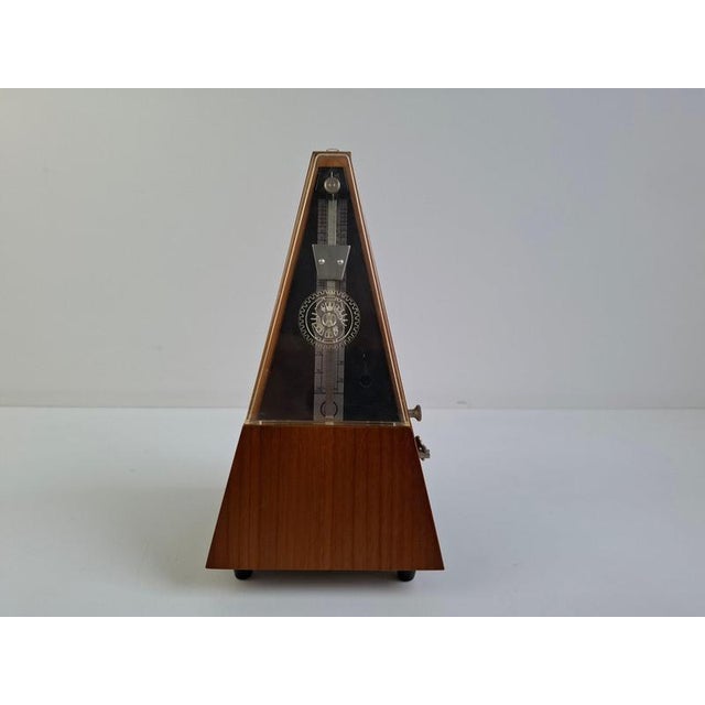 An authentic Wittner mechanical metronome, manufactured in Germany circa 1970, showcasing the clean lines and practical...