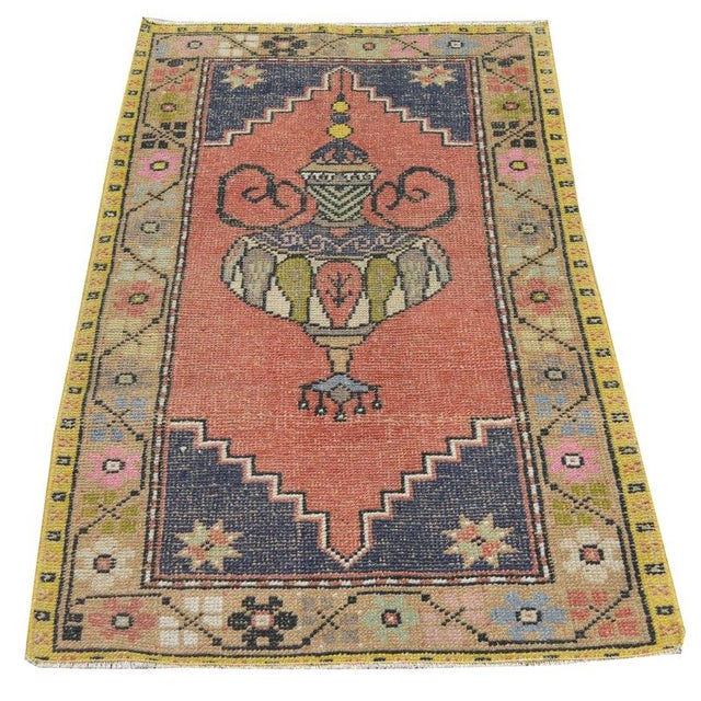 Hand-knotted with care using traditional rug-making techniques, this wool rug blends timeless craftsmanship with a modern...