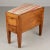 A 19th Century French shoe shine stool made of solid walnut. The upholstered seat opens to a felt lined interior for...