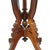 An antique Eastlake style carved walnut square table, dating from approximately 1890. This elegant table features a...