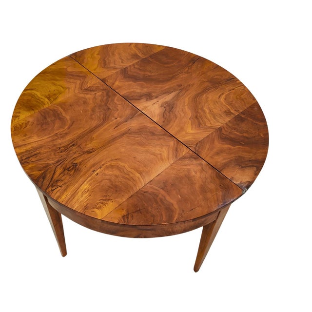 Beautiful Demi Lune Biedermeier table can be placed against the wall as a semi-circular console. Or folded out in the...