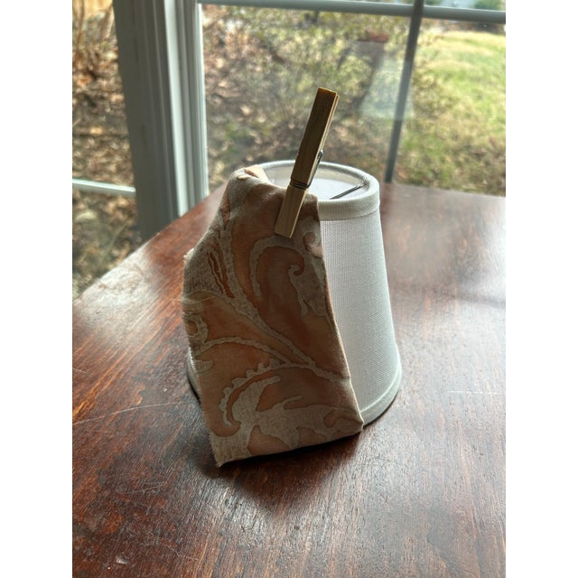 a clip top chandelier shade handmade with Fortuny’s iconic printed cotton. Measurement: top3” bottom 6” side5”