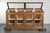 This counter/museum cabinet has 4 doors and removable shelves; the top of the cabinet opens. Through years of proper use,...