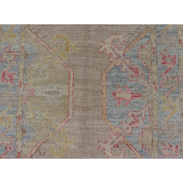 Hand-Knotted Oushak Runner With Medallion Design on a Tan Field With Red & Blue For Sale - Image 9 of 13