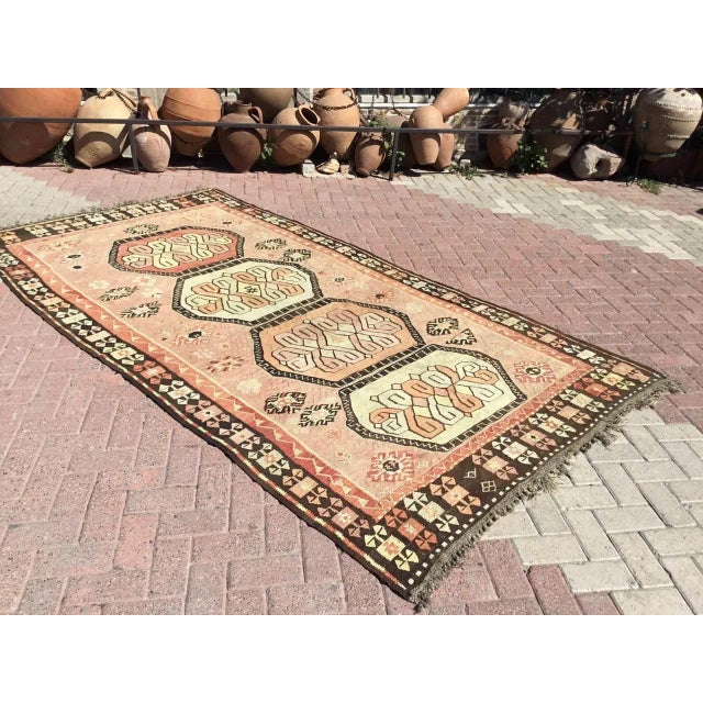 This beautiful, vintage, handwoven kilim is approximately 60 years old. It is handmade of very fine quality, hand-spun...