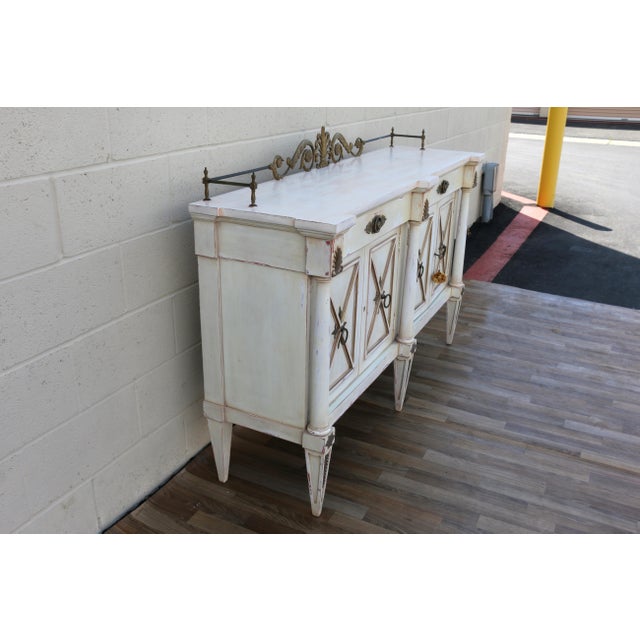 An elegant vintage neoclassical sideboard by Karges Furniture, crafted in the 1950s and embodying the timeless...