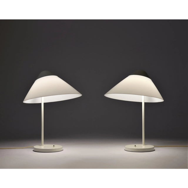 Rare and beautiful pair of white table lamps by Hans J. Wegner for Louis Poulsen, Denmark. Model ''Opala''. The lamps have...