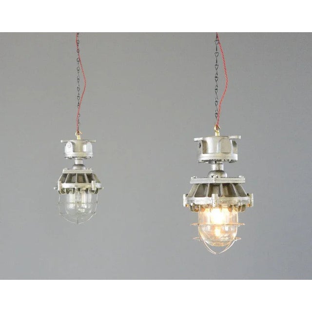 Explosion Proof Pendant Lights By Wardle Circa 1930s. Cast iron with steel cages - Flame prood glass with "Wardle"...