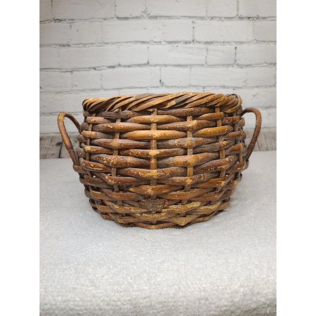 Vintage double-handle hand-woven split cane rattan basket. Woven using thick split cane. Sturdy and well-built. Its...