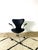 Rare early version of Arne Jacobsen’s “Seven” office chair, with the original wheel base. The armchair has received new...
