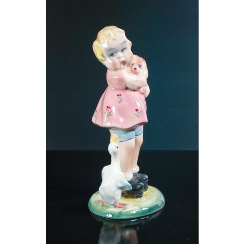 Porcelain sculpture little girl with goose and baby in her arms, tarcisio tosin for la freccia. Vicenza, 1930s origin...