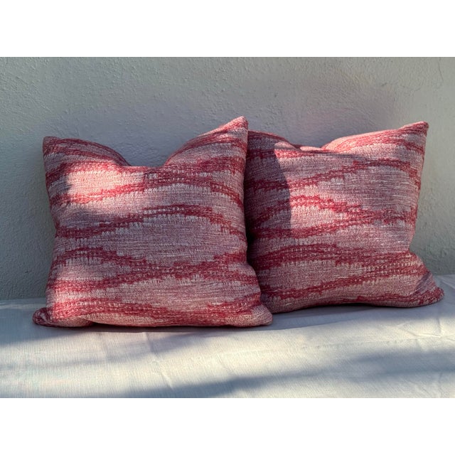 really gorgeous all new Kathryn Ireland rich pink woven ikat pillows, with feather and down fill. All aspects brand new....