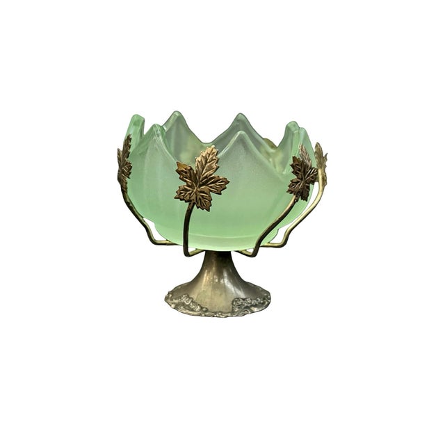 A jewel-toned English accent piece with sculptural presence. This vintage Brama bowl pairs frosted sea-green art glass...
