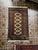 This hand-knotted Oriental rug is a beautiful piece of craftsmanship, featuring a rich pattern and deep, warm colors....