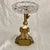 Beautiful lady from the gilded age base with a crystal ashtray adorning her head. From the 1950's when everyone smoked but...