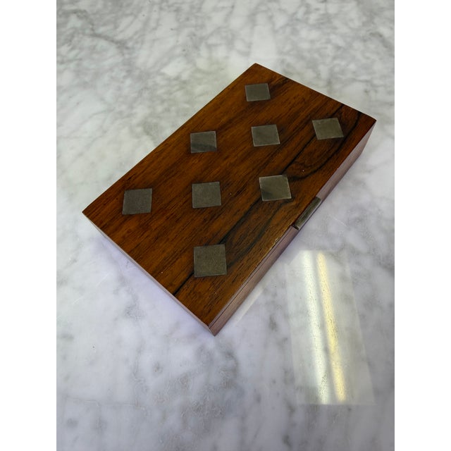 Elevate your vanity, desk, or dresser with this rare and highly collectible Danish Modern rosewood decorative box,...