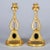 Pair unusual Victorian gilded bronze candlesticks set with three oval black stone intaglios on a pyramid shape below a...