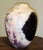 A striking studio pottery vase by California ceramic artist Joel Magen, showcasing his signature marbled, mineral‑strata...