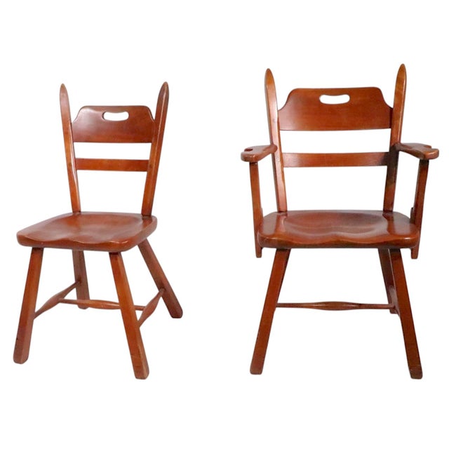 Exceptional set of six Cushman Colonial Creations dining chairs, designed by Herman DeVries. The set is in very good,...