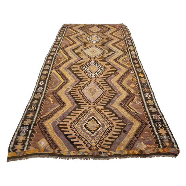 Vintage handwoven kilim rug from Kars region of Turkey. Approximately 55-65 years old. In very good condition.