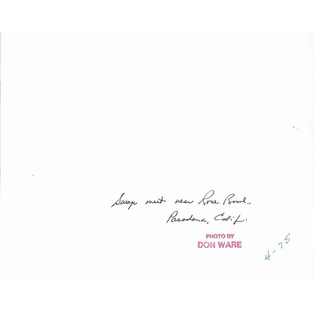 1975 black and white photograph by Los Angeles photographer Don Coleman Ware (1921-2006) of a swap meet near the Rose Bowl...