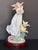 This is a limited edition Lladró "Mystical Garden" figurine (model 6686) featuring a fairy holding flowers.It was sculpted...