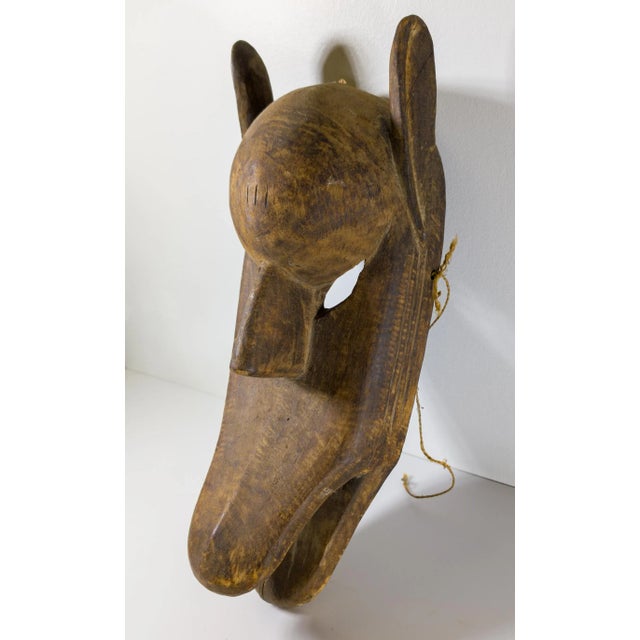 We are selling this decorative carved 20th century African mask. This tribal mask is carved in the Bamana Kore style of...