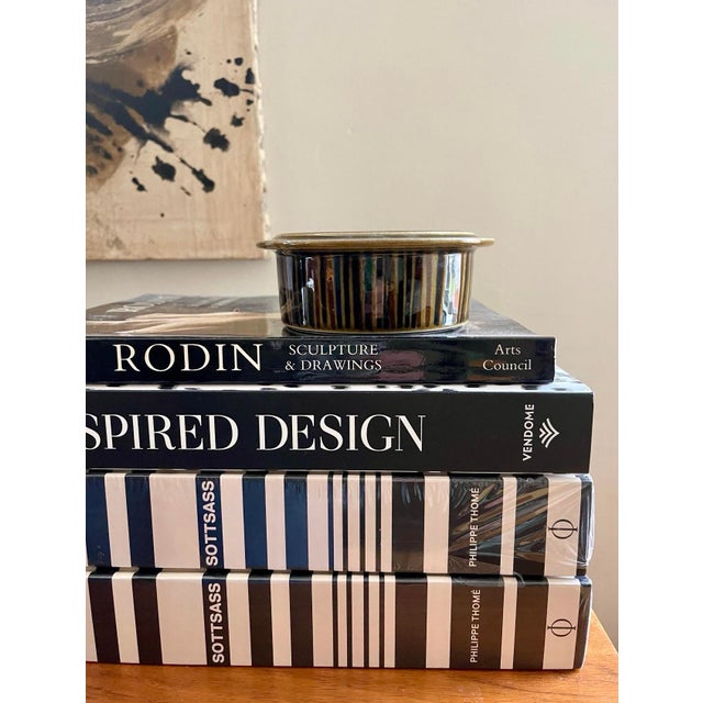 Gorgeous small bowl by Arabia, made in Finland. This ceramic bowl has a beautiful golden coppery olive glaze with vertical...