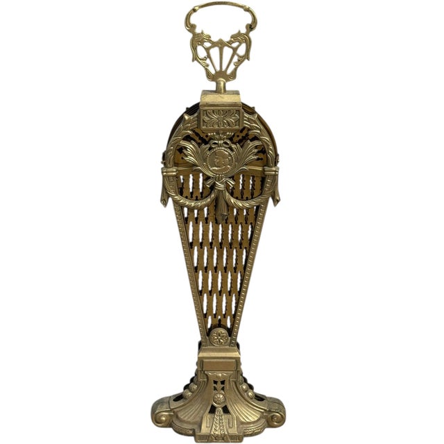 This 1930’s Brass Peacock Fireplace Screen features a beautifully draped cameo profile centerpiece. When fully extended,...